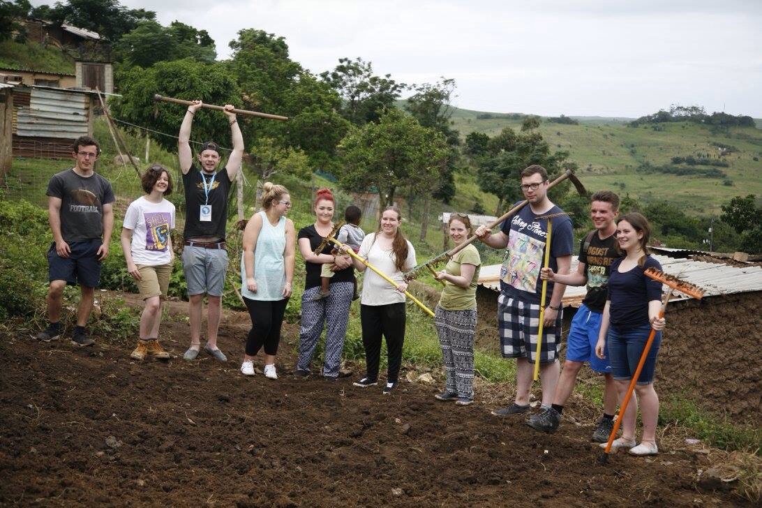 My wonderful team just after we finished the vegetable patch at the house